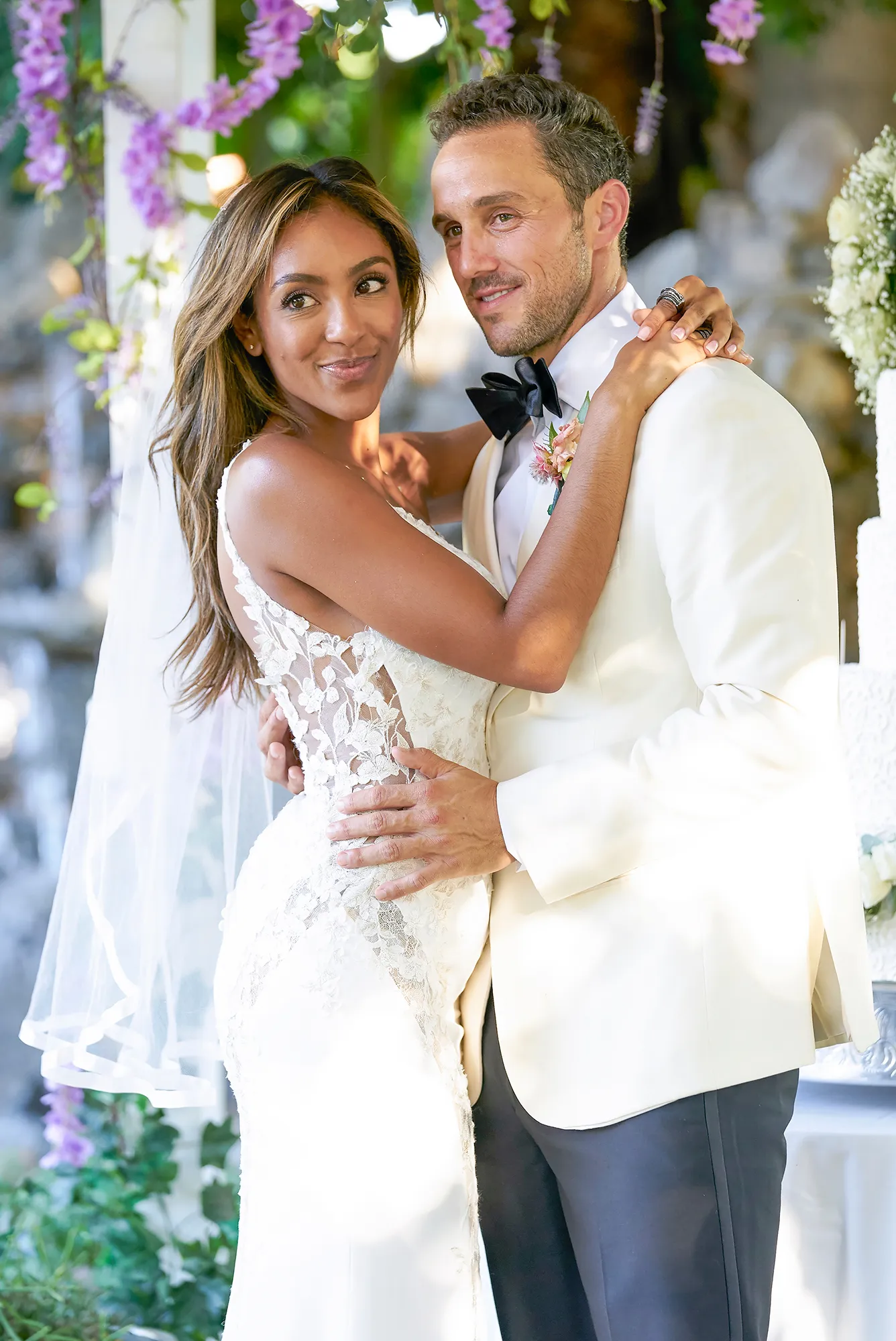 Bachelorette’s Tayshia Adams Denies That ‘Never Settle’ Post Is About Fiance Zac Clark