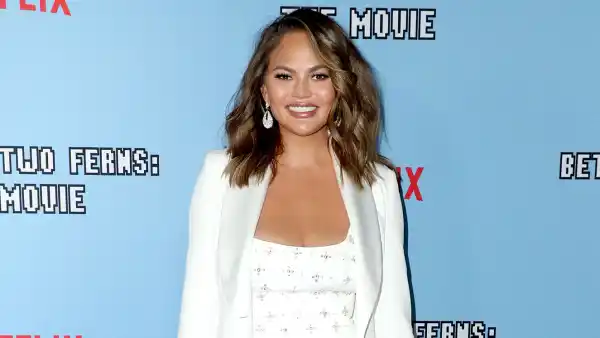 Chrissy Teigen Explains Why Hasn’t Fully Processed 2020 Miscarriage White Dress Jacket