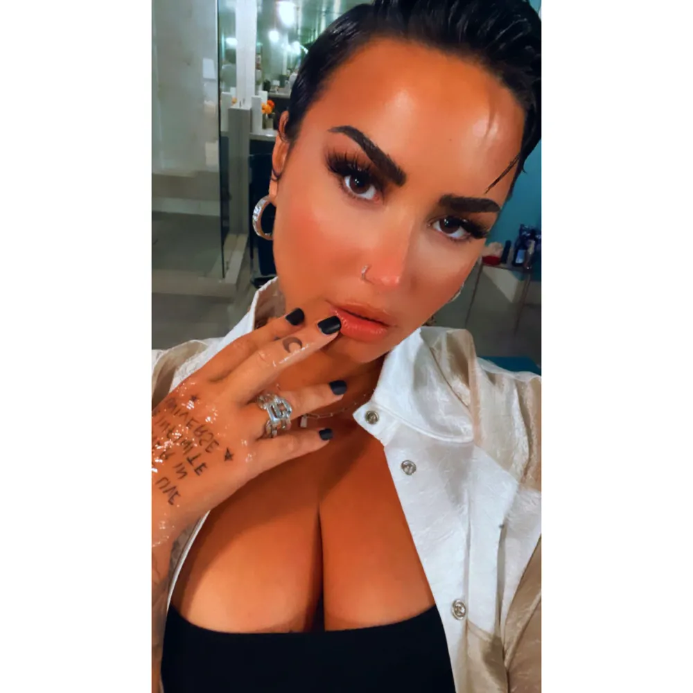 Demi Lovato Debuts &lsquo;Perfect&rsquo; New Hand Tattoo: &lsquo;Love Will Live Forever in the Infinite Universe&rsquo;