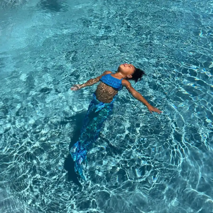 See Kylie Jenner’s Daughter Stormi Swimming With Mermaid Tail