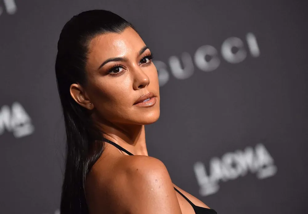 Attention Travis Kourtney Kardashian Is Promoting Sex Belts Now