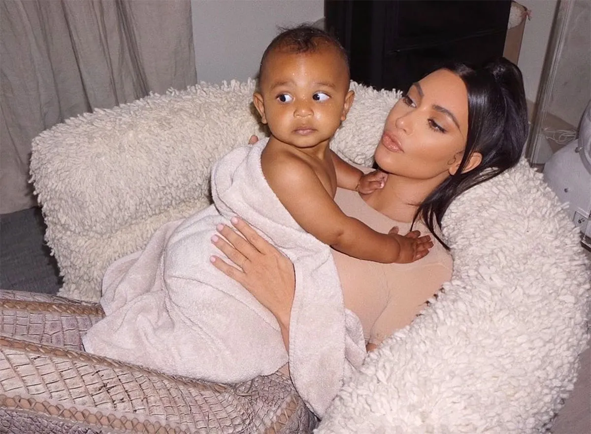 Kim Kardashian Corrects Ellen DeGeneres for Assuming Son Psalm Gold Chain Is Fake Feature