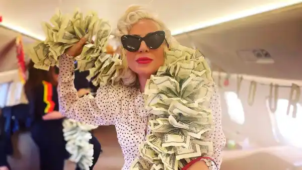 ‘Vegas Baby!' Lady Gaga Wears Boa Made of $100 Bills and Pink Hermès Birkin on Private Jet