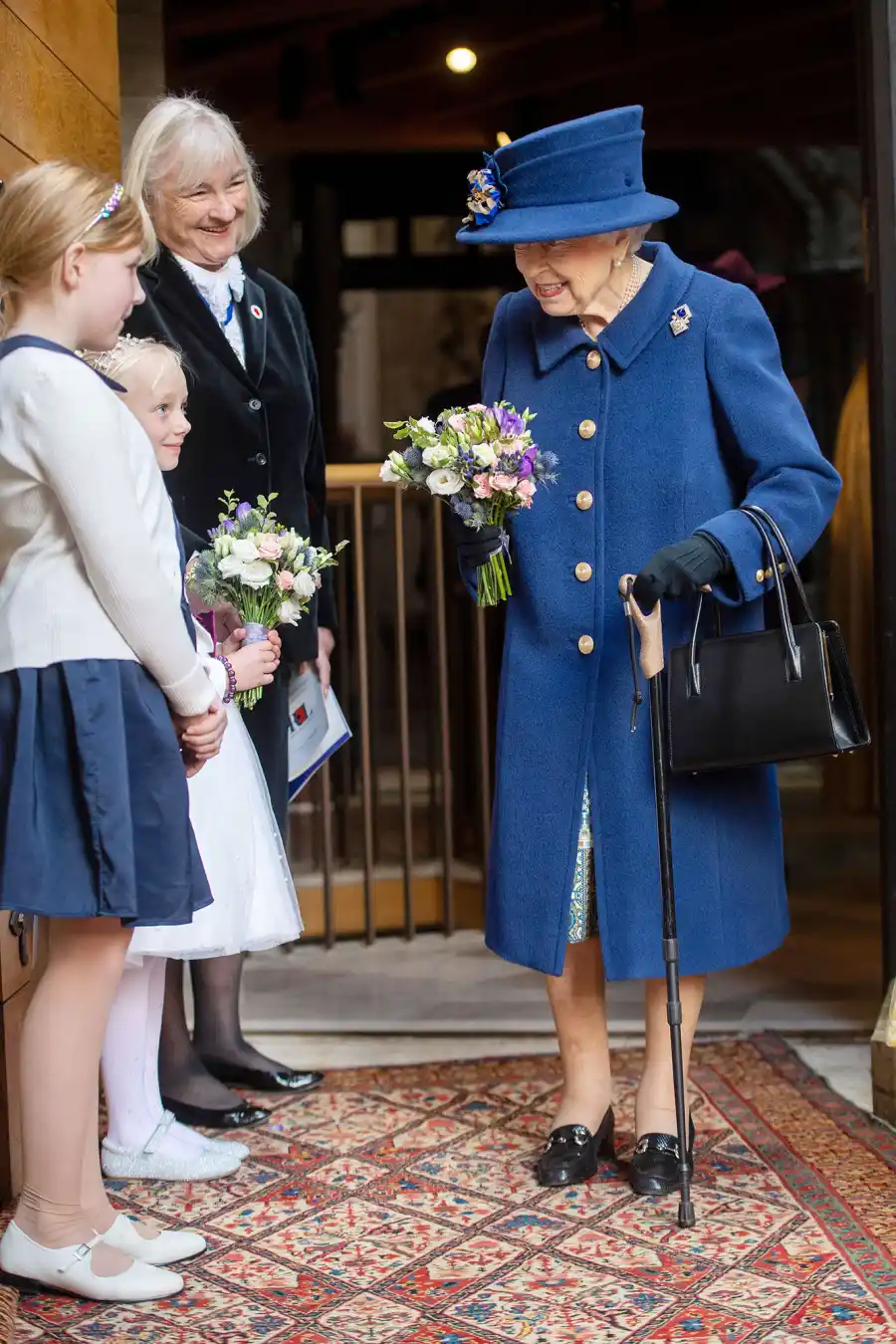 Queen Elizabeth II Uses Cane Attend Westminster Service