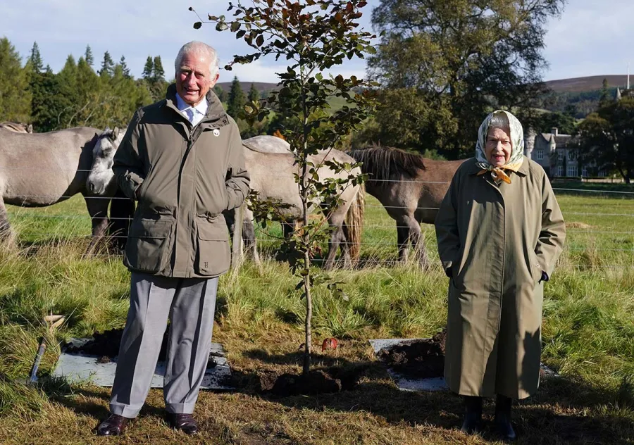 Queen Elizabeth Meets Local Schoolchildren During Outing With Prince Charles