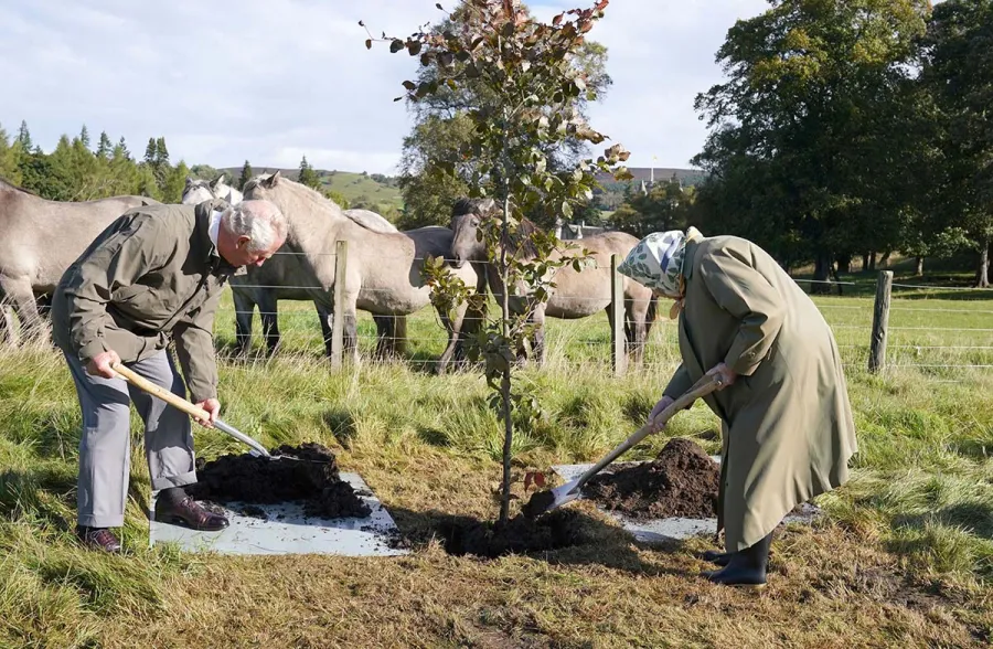 Queen Elizabeth Meets Local Schoolchildren During Outing With Prince Charles
