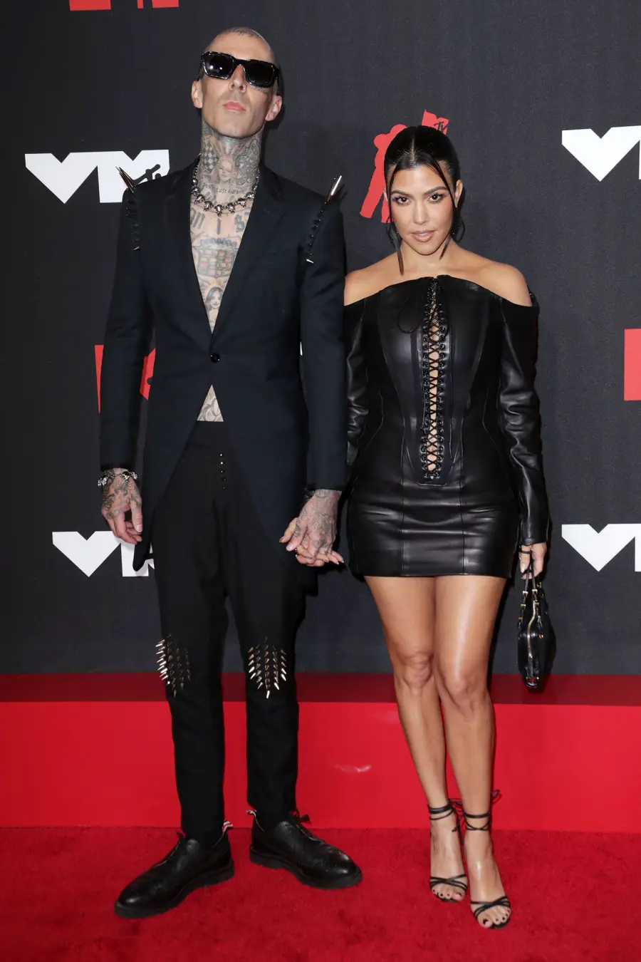See Kourtney Kardashian Travis Barker Rocker Chic Couple Style