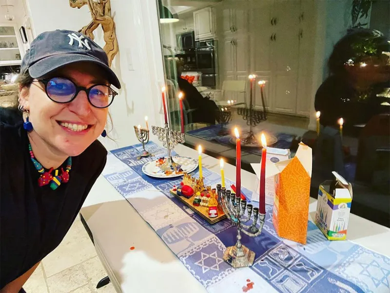 Hanukkah 2021 Andy Cohen Mayim Bialik and More Celebrate