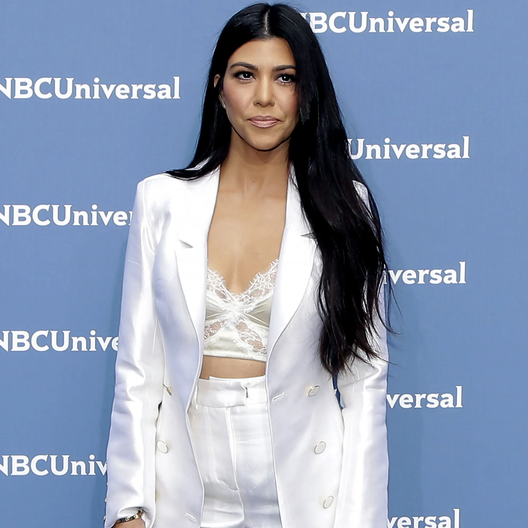 Kourtney Kardashian Stuns in Trench Coat Designed by Megan Fox