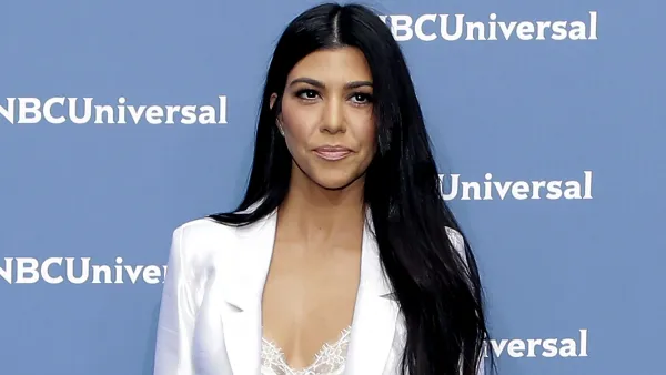 Kourtney Kardashian Stuns in Trench Coat Designed by Megan Fox