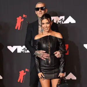 Kourtney Kardashian and Travis Barker Take PDA to Another Level With Christmas-Themed Foot Pic