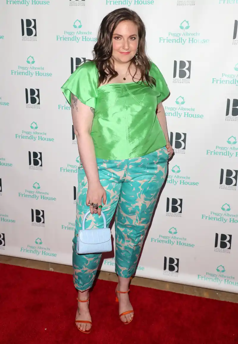 Lena Dunham Rocks a Mint Green One-Piece While Paddleboarding Promo