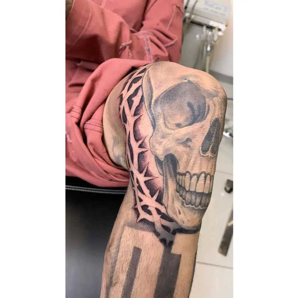 Travis Barker Gets a Massive Barbed Wire Tattoo During His Dentist Appointment 3