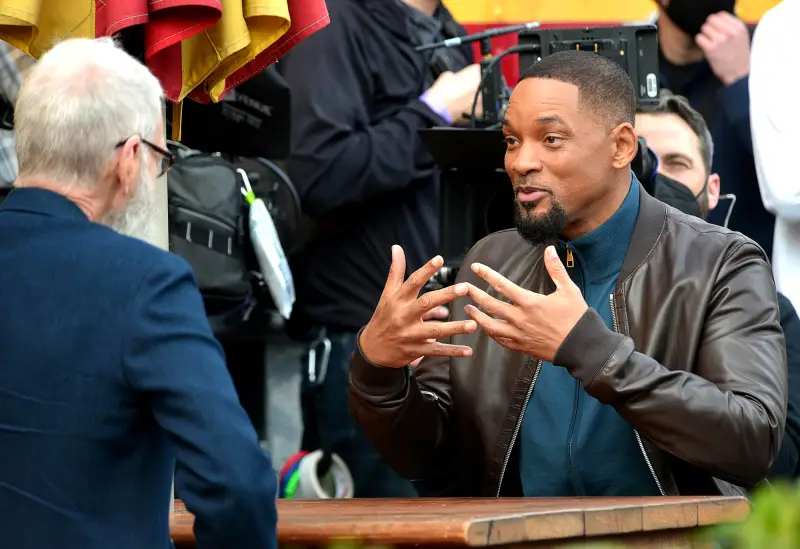 Will Smith gets very animated as he is spotted being interviewed by David Letterman at Carney's Hot Dogs in West Hollywood, Los Angeles, California, USA - 13 Jan 2022