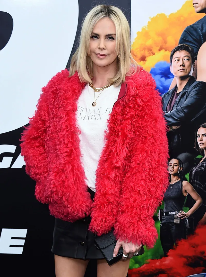 Charlize Theron Takes a Selfie With Mystery Man at Super Bowl