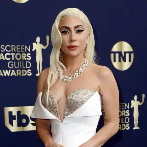 House of Gucci Nominee Lady Gaga Sparkles in White and Gold at the 2022 SAG Awards
