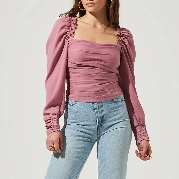 pink top and jeans