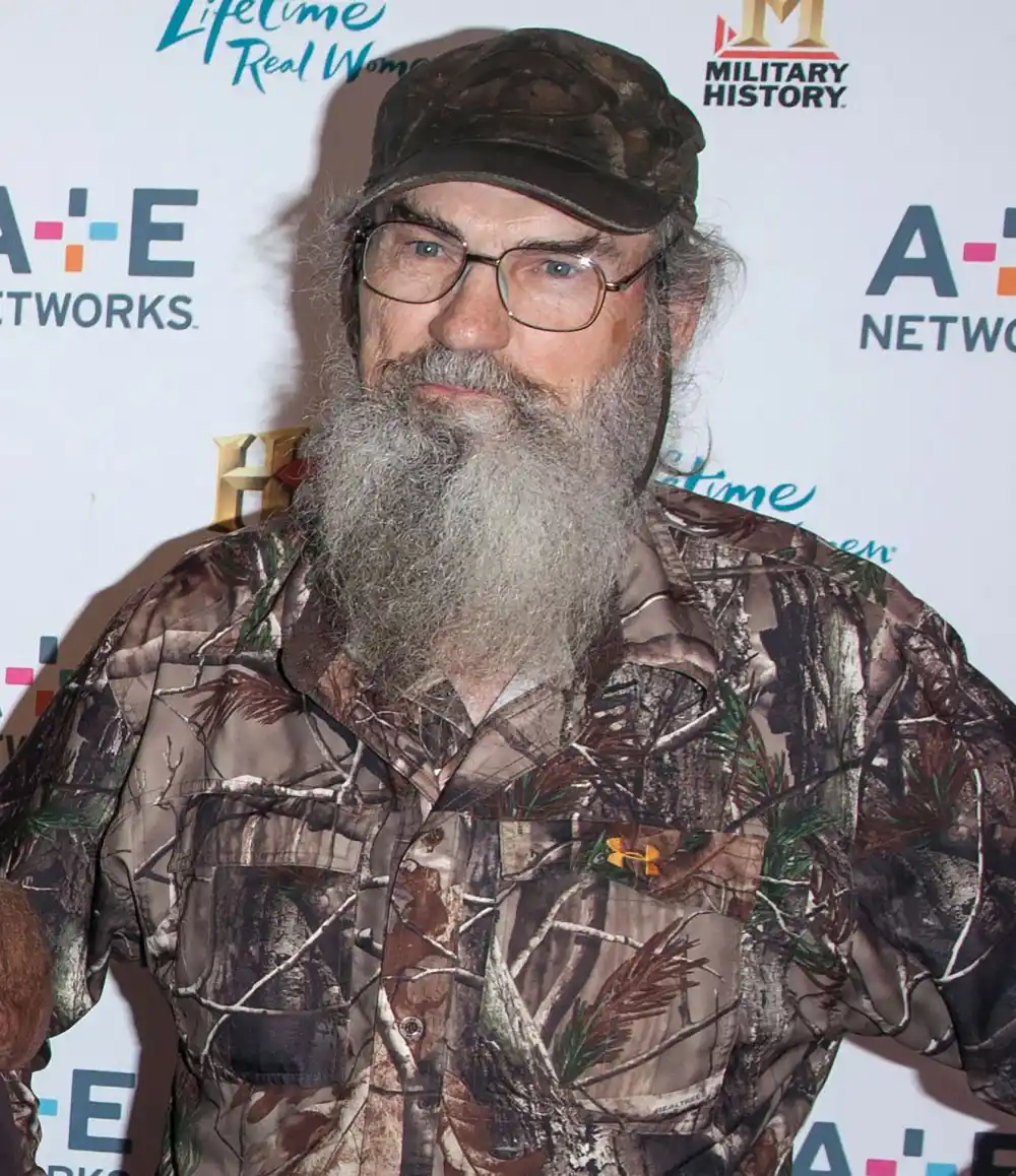 Duck Dynasty&rsquo;s Uncle Si Robertson Reveals the Real Reason His Wife Christina Isn&rsquo;t on TV Si in camo