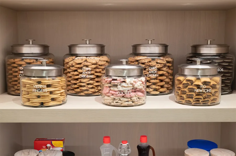 Inside Khloe Kardashian's Super Organized Pantry: See Photos of Her Labeled Snacks, Display Dishes and More