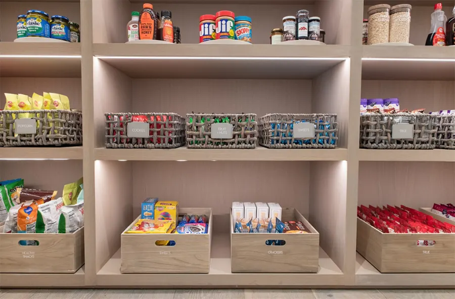 Inside Khloe Kardashian's Super Organized Pantry: See Photos of Her Labeled Snacks, Display Dishes and More