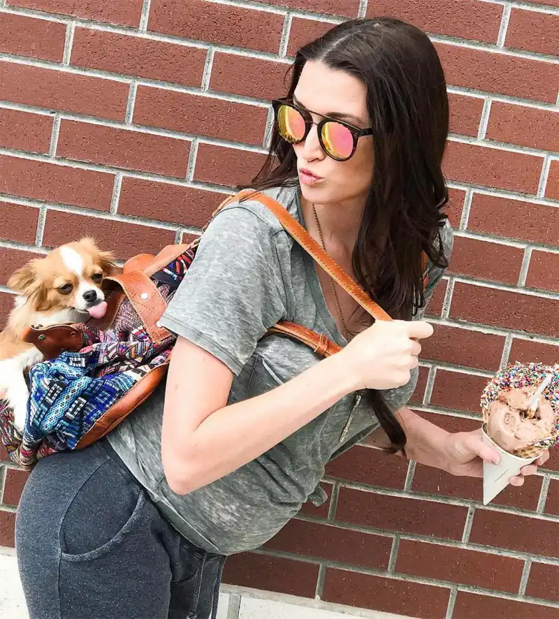 Expectant Celebrity Moms Cuddling Up With Beloved Pets Amid Pregnancy