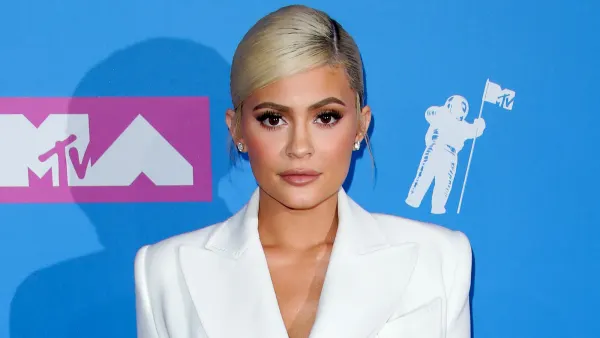 Kylie Jenner Stuns in Over-the-Knee Boots and Black Dress 2 Months Postpartum: Photo