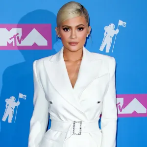 Kylie Jenner Stuns in Over-the-Knee Boots and Black Dress 2 Months Postpartum: Photo