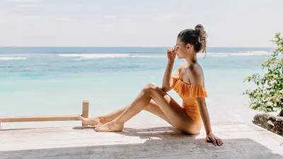 Woman-Wearing-Bathing-Suit-Stock-Photo