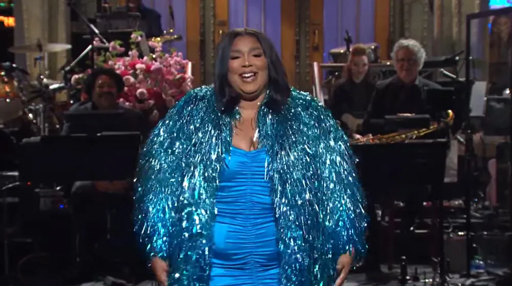Lizzo Addresses Chris Evans Dating Speculation on 'Saturday Night Live': 'It's Called Manifesting'