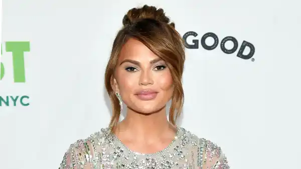 Chrissy Teigen Calls Out Fan Who Claims She Gets Constant Liposuction
