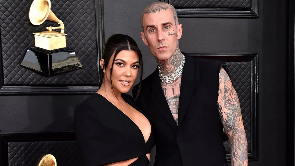 Classic Kravis! Watch Travis Barker Remove Kourtney's Garter With His Teeth