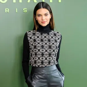 Feature Kendall Jenner Hilariously Struggles to Walk Up Steep Stairs in Tight Dress at Sister Kourtney's Wedding