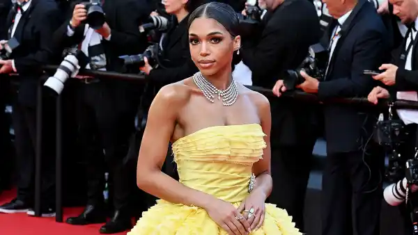 Lori Harvey Says She Felt Like 'Belle' as She Made Her Cannes Debut in Yellow Ruffled Gown