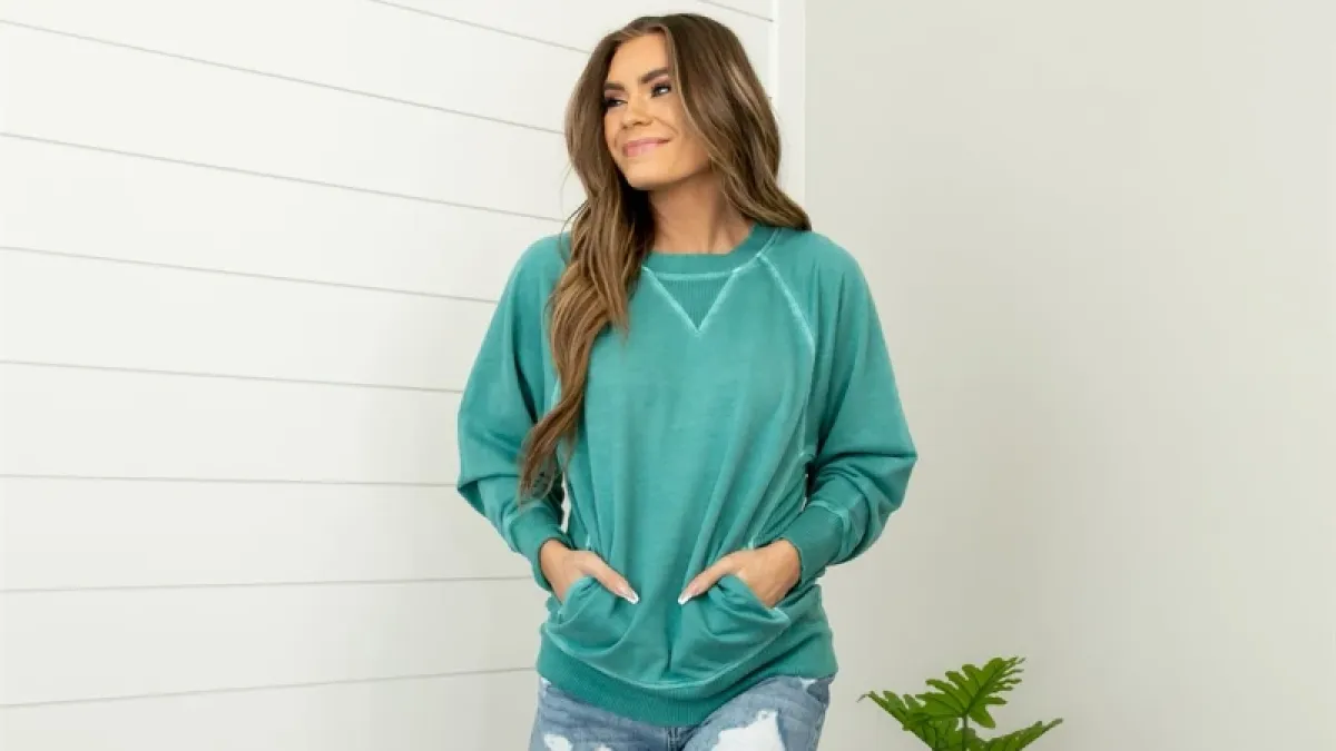 teal sweatshirt