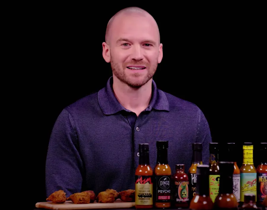 Khloe Kardashian Asks Hot Ones Host Sean Evans If He’s Flirting After He Calls Her Pantry Impressive