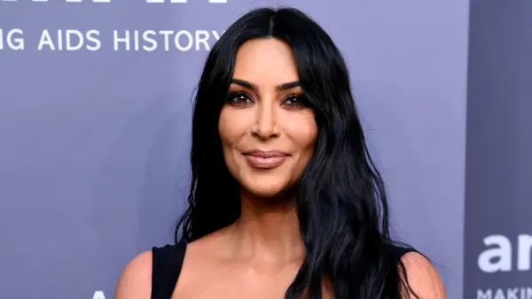 Kim Kardashian Flaunts Her Curves in a See-Through Turtleneck Dress With a Cutout at the Hip