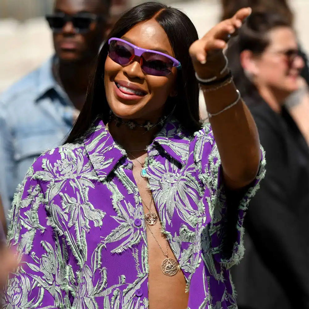 Naomi Campbell Wows in Deep Cut Purple Shirt