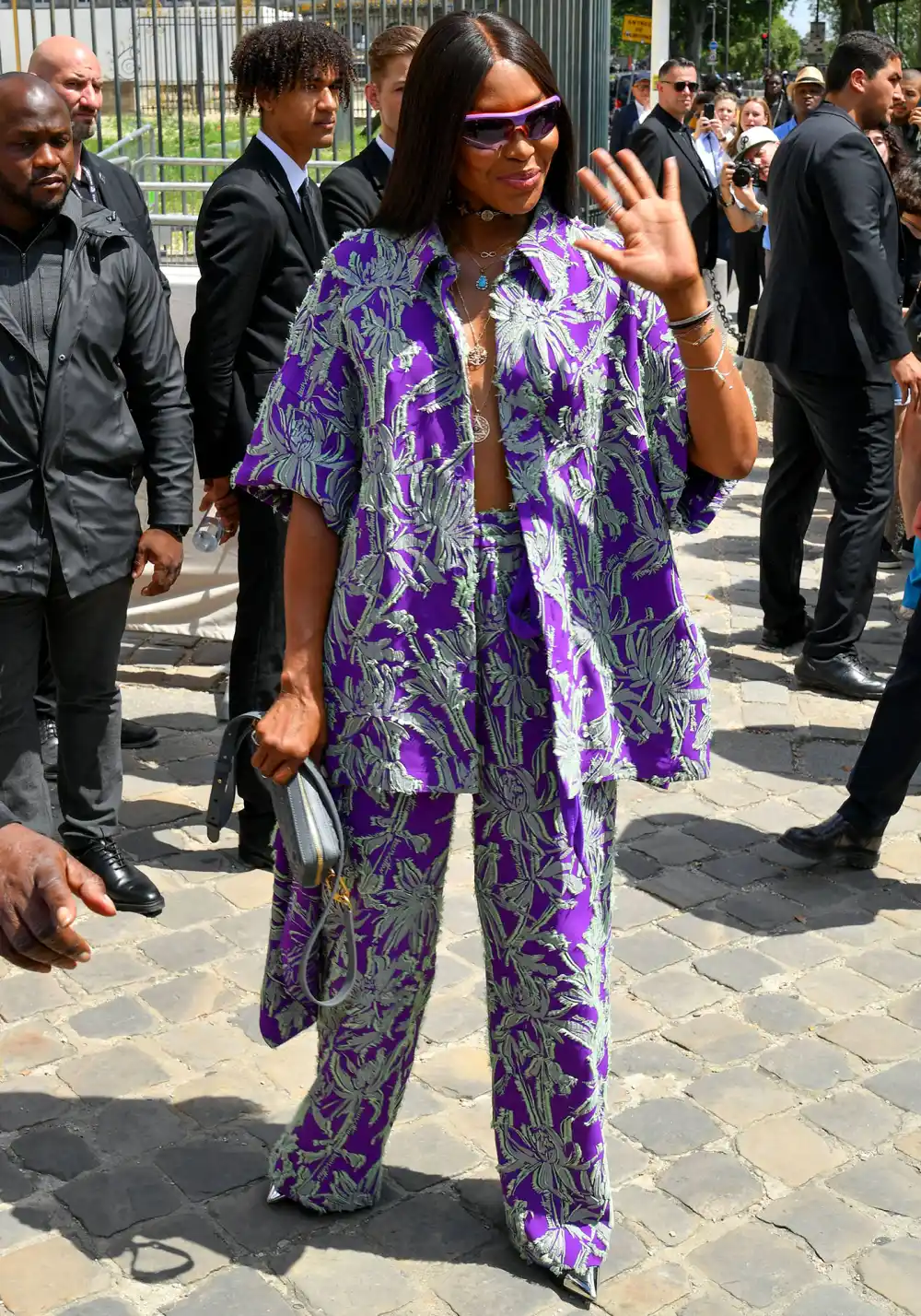 Naomi Campbell Wows in Deep Cut Purple Shirt