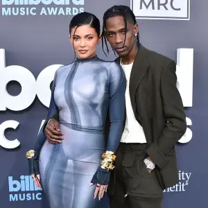 Travis Scott Shares Since-Deleted Throwback Steamy Photo With Nude Girlfriend Kylie Jenner