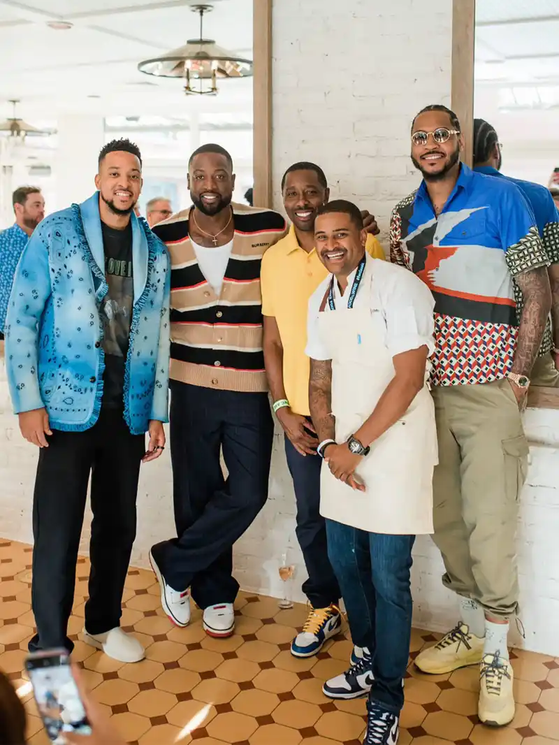 hot pics NBA superstars Dwyane Wade, Carmelo Anthony, CJ McCollum with Chef JJ Johnson of Fieldtrip, and La Fête Wine Company Founder Donae Burston Black on Black Dinner at Hotel Jerome in Aspen Food & Wine Classic