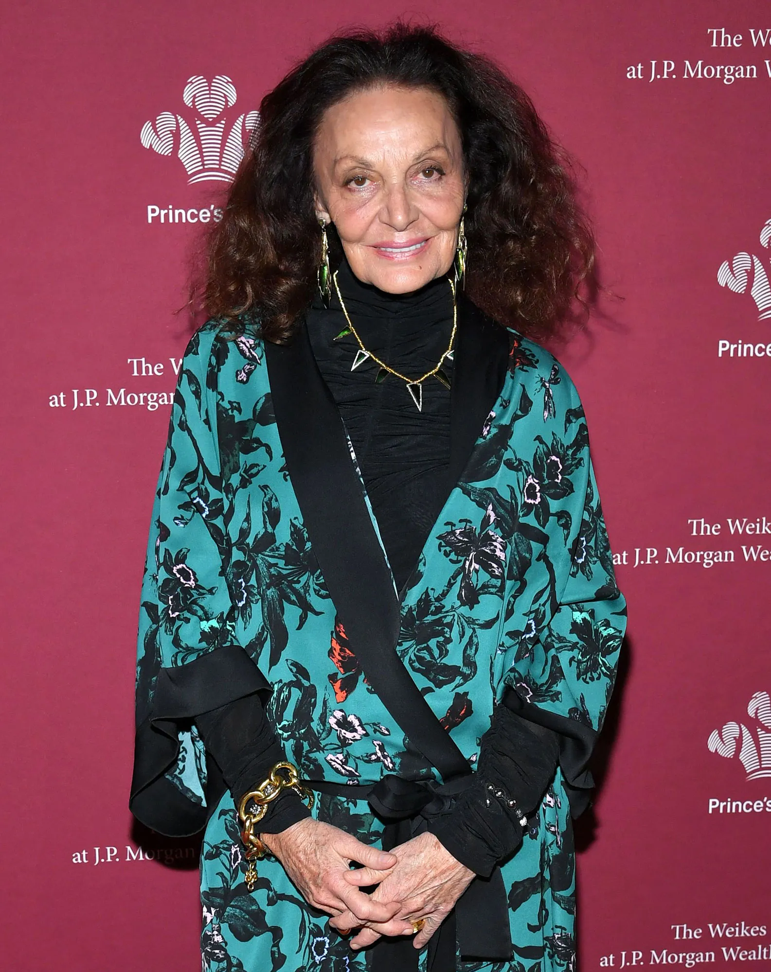 Diane von Fürstenberg Wows in High Cut Red Swimsuit