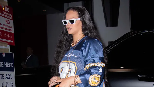 Rihanna Rocks Clogs and a Football Jersey