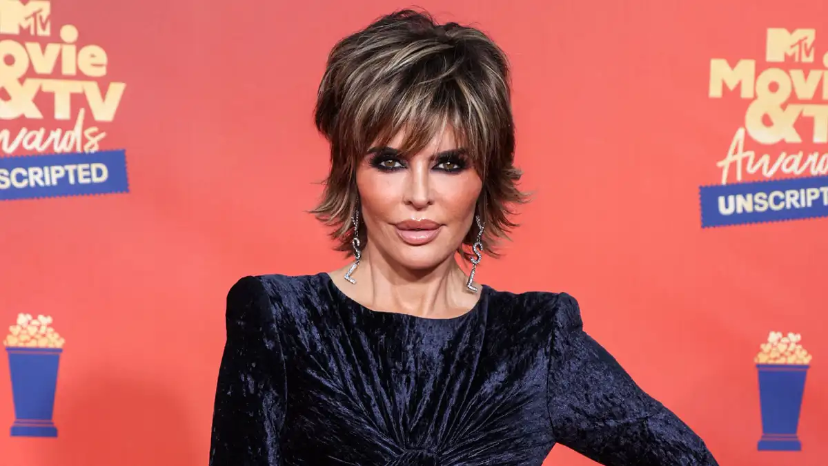 Lisa Rinna Looks Unreal as Flashes Her Best Smize in a Sexy String Bikini