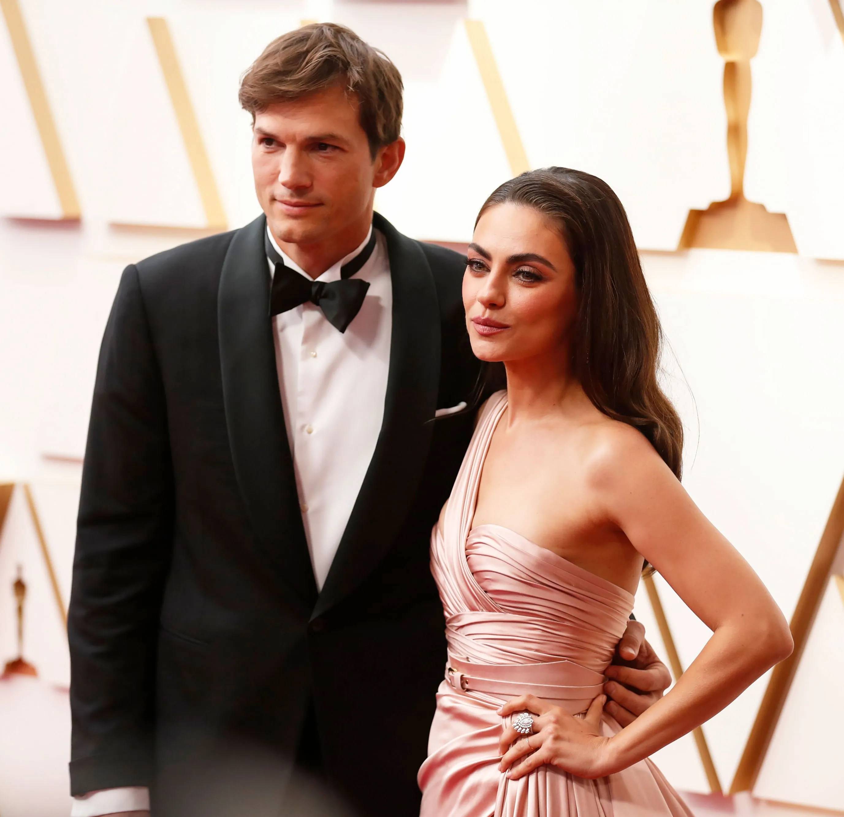 Mila Kunis Reveals How She and Ashton Kutcher Were Able to 'Power Through' His Health Scare: ‘You Just Do’ blush gown