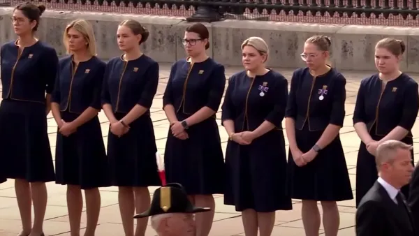 Queen Elizabeth's Staff Line Up to Watch Procession Pass Buckingham Palace