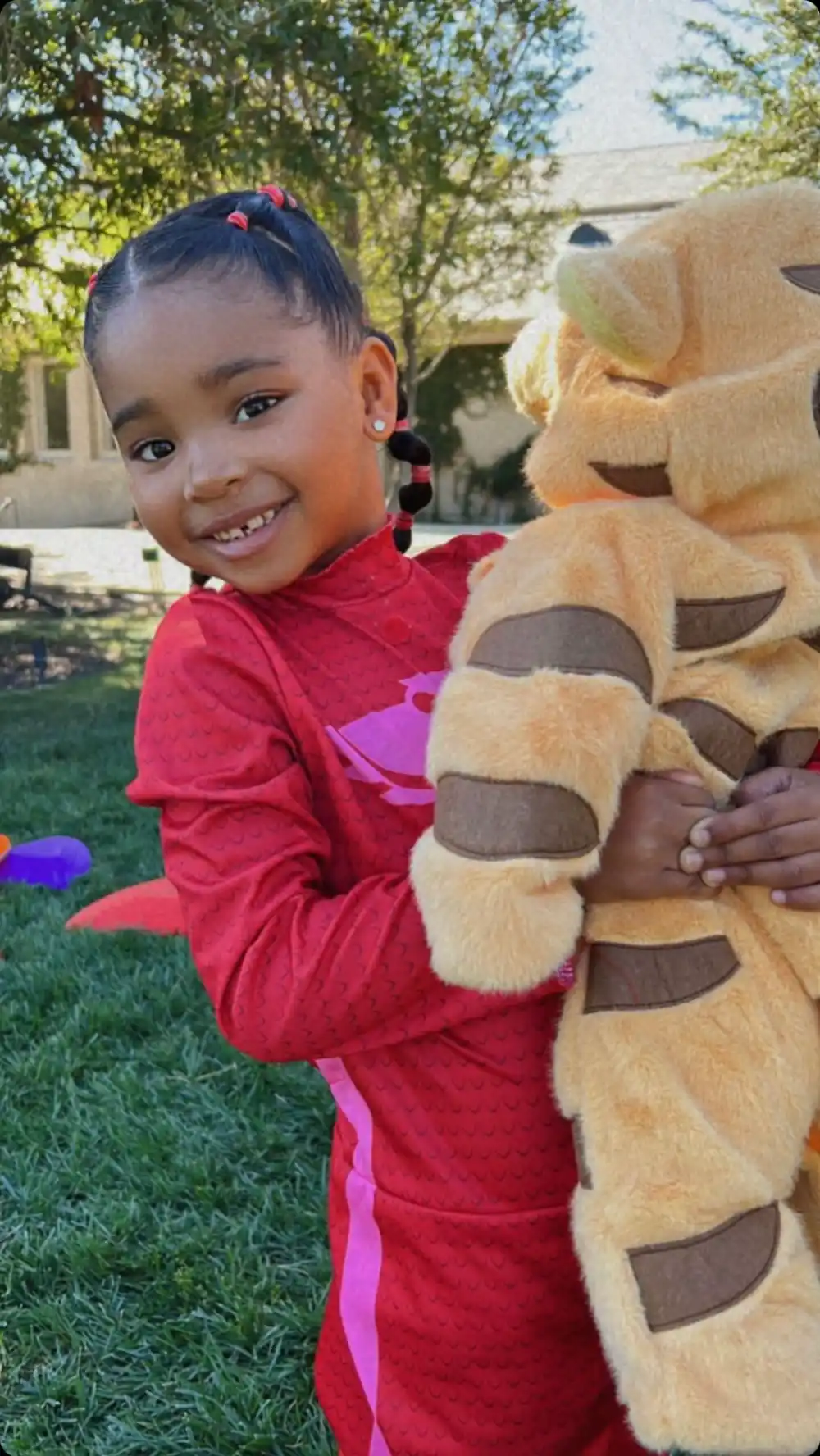 True Thompson and baby brother