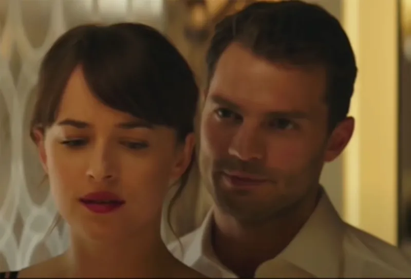 'Fifty Shades Darker' Photos: See Jamie Dornan and Dakota Johnson's Hottest Moments! over shoulder