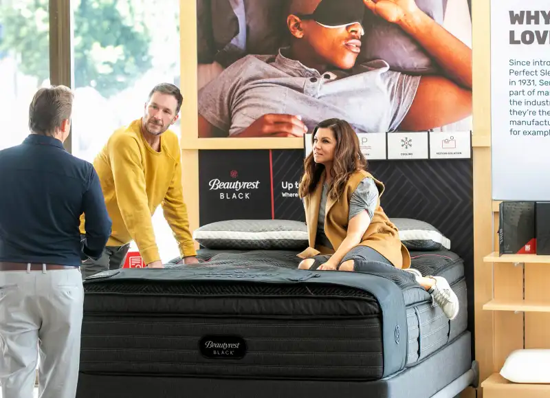 Actress Tiffani Thiessen and husband Brady go mattress shopping