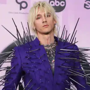 Machine Gun Kelly Attends 2022 American Music Awards in Spike-Covered Purple Suit- Photos American Music Awards (AMAs) 2022 019 American Music Awards, Arrivals, Los Angeles, California, USA - 20 Nov 2022