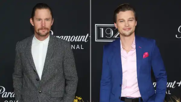 '1923' Cast Shares Secrets of 'Yellowstone' Cowboy Camp: 'A Lot of Ice Baths' blue suit